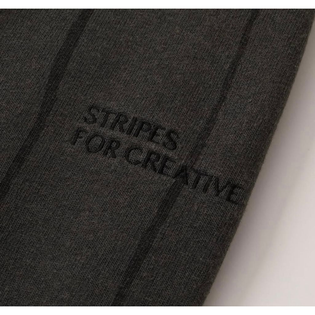 S.F.C STRIPE WIDE SWEAT PANTS (DISCHARGED)