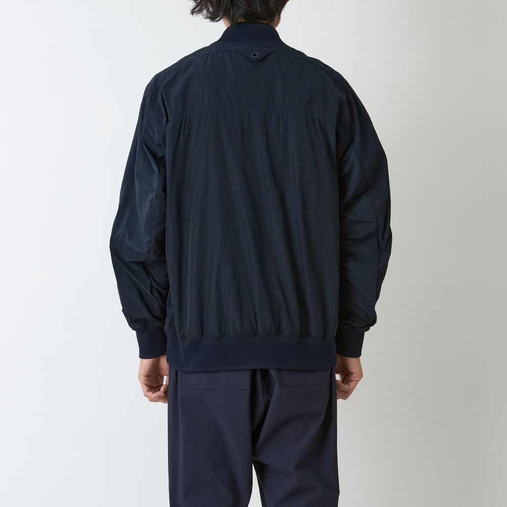 WHITE MOUNTAINEERING ASYMMETRY FLIGHT JACKET