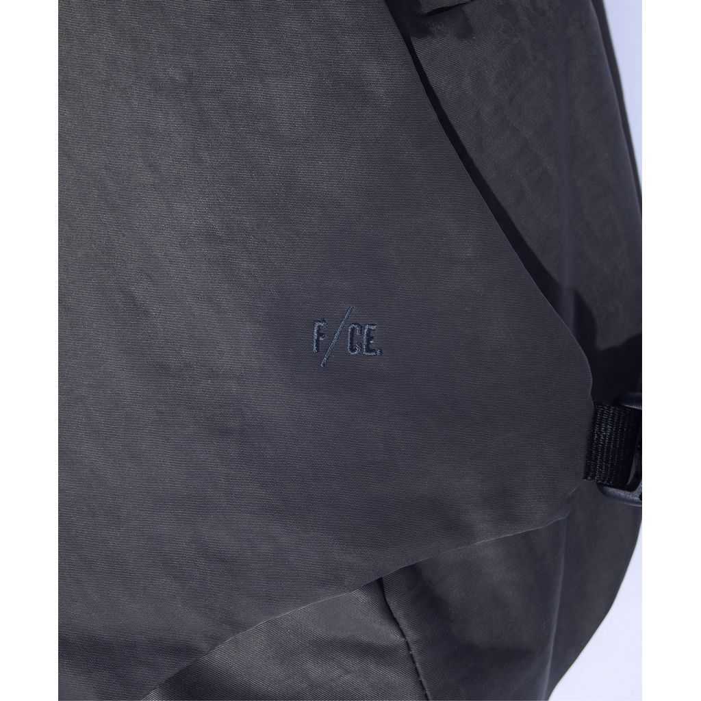 F/CE. TEXTURED TWILL LAYERED SLINGER BAG