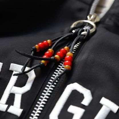 AMBERGLEAM Embroidered Satin Blouson