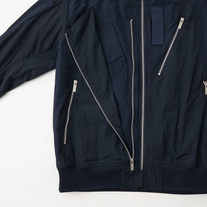 WHITE MOUNTAINEERING ASYMMETRY FLIGHT JACKET