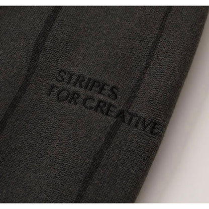 S.F.C STRIPE WIDE SWEAT PANTS (DISCHARGED)