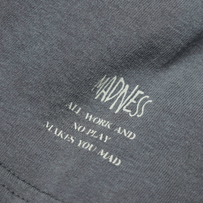 MADNESS TEAR OFF GRAPHIC SUN-FADED TEE