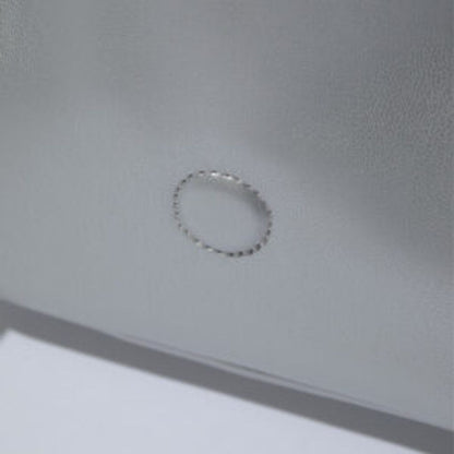 F/CE. TECH LEATHER EYELET MINI POACH