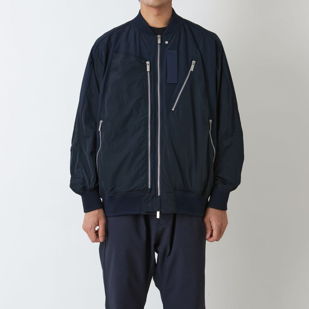 WHITE MOUNTAINEERING ASYMMETRY FLIGHT JACKET