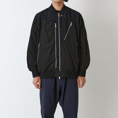 WHITE MOUNTAINEERING ASYMMETRY FLIGHT JACKET