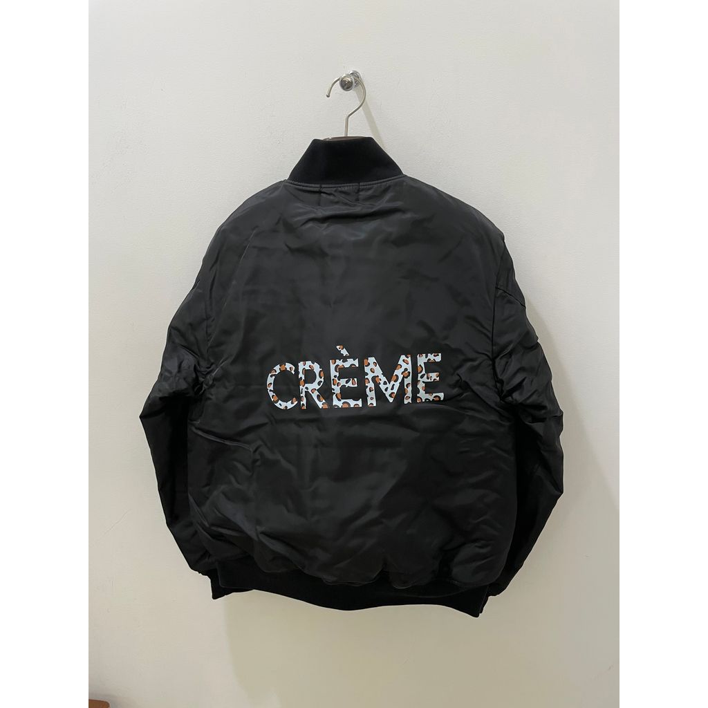 UN   VARSITY JACKET ”CRÈME”