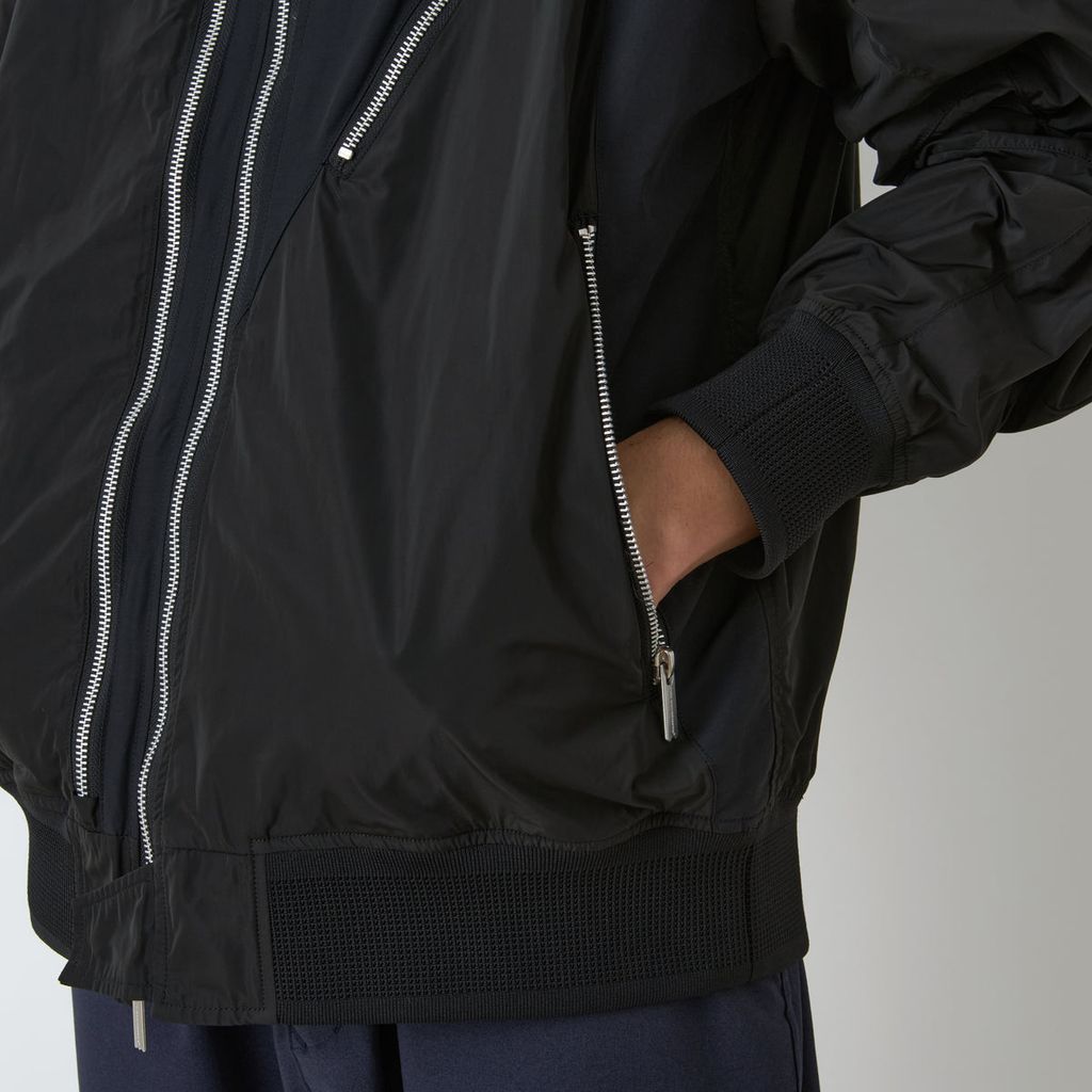 WHITE MOUNTAINEERING ASYMMETRY FLIGHT JACKET