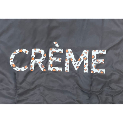 UN   VARSITY JACKET ”CRÈME”