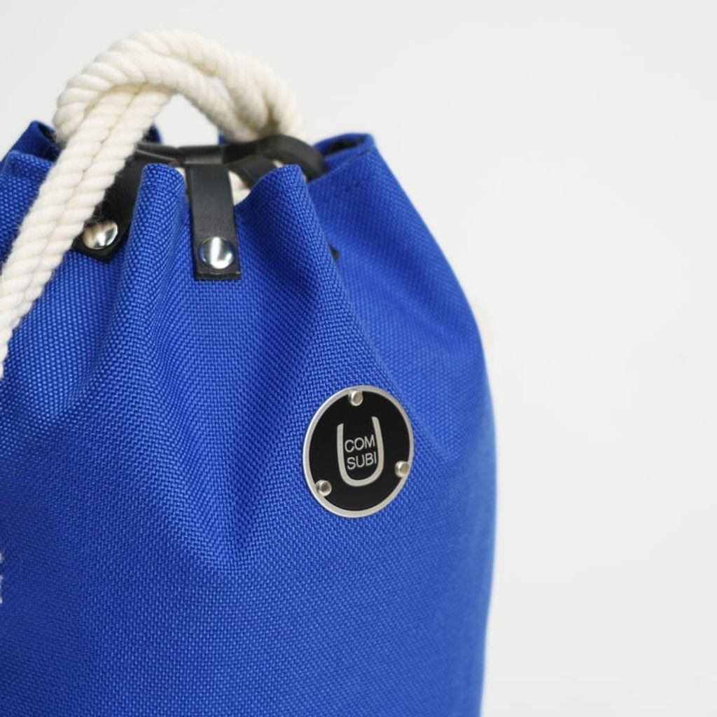 COMUSUBI (コムスビ) ／ COMUSUBI BAG "Cordura®︎" -Blue-