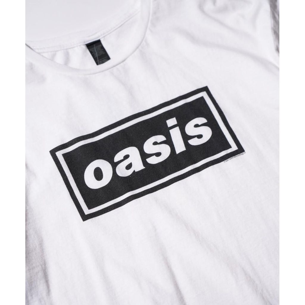 THRIFTY LOOK  OASIS DECCA LOGO TEE
