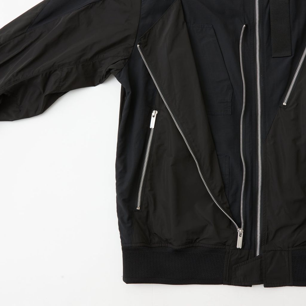 WHITE MOUNTAINEERING ASYMMETRY FLIGHT JACKET