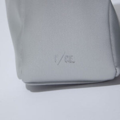 F/CE. TECH LEATHER EYELET MINI POACH