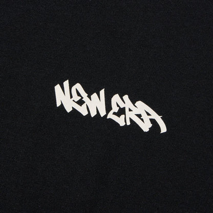NEW ERA 長袖 オーバーサイズド コットン Tシャツ Tagging ブラック
