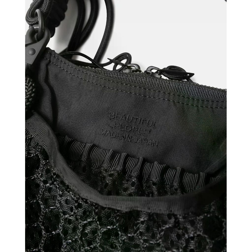 beautiful people  over engineering hanging tote bag