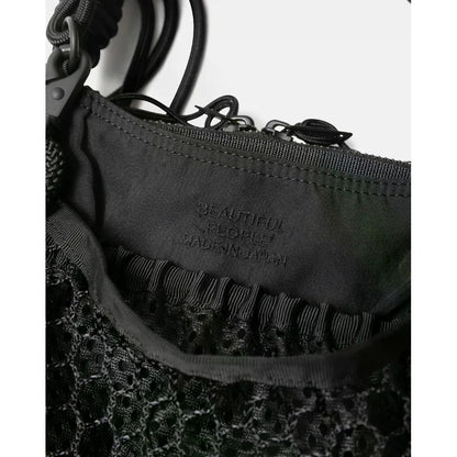 beautiful people  over engineering hanging tote bag