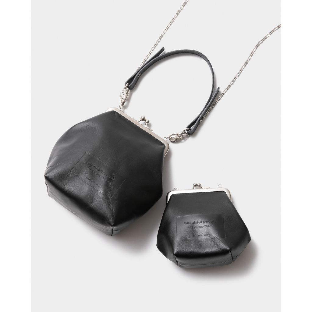 beautiful people  clasp shoulder hand pouch