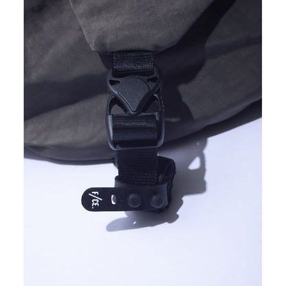 F/CE. TEXTURED TWILL LAYERED SLINGER BAG