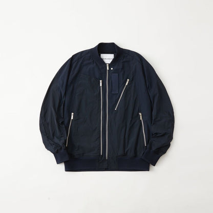 WHITE MOUNTAINEERING ASYMMETRY FLIGHT JACKET