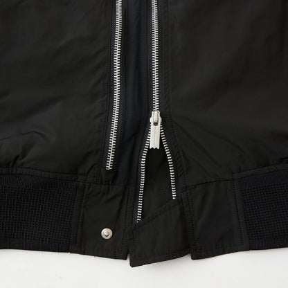 WHITE MOUNTAINEERING ASYMMETRY FLIGHT JACKET