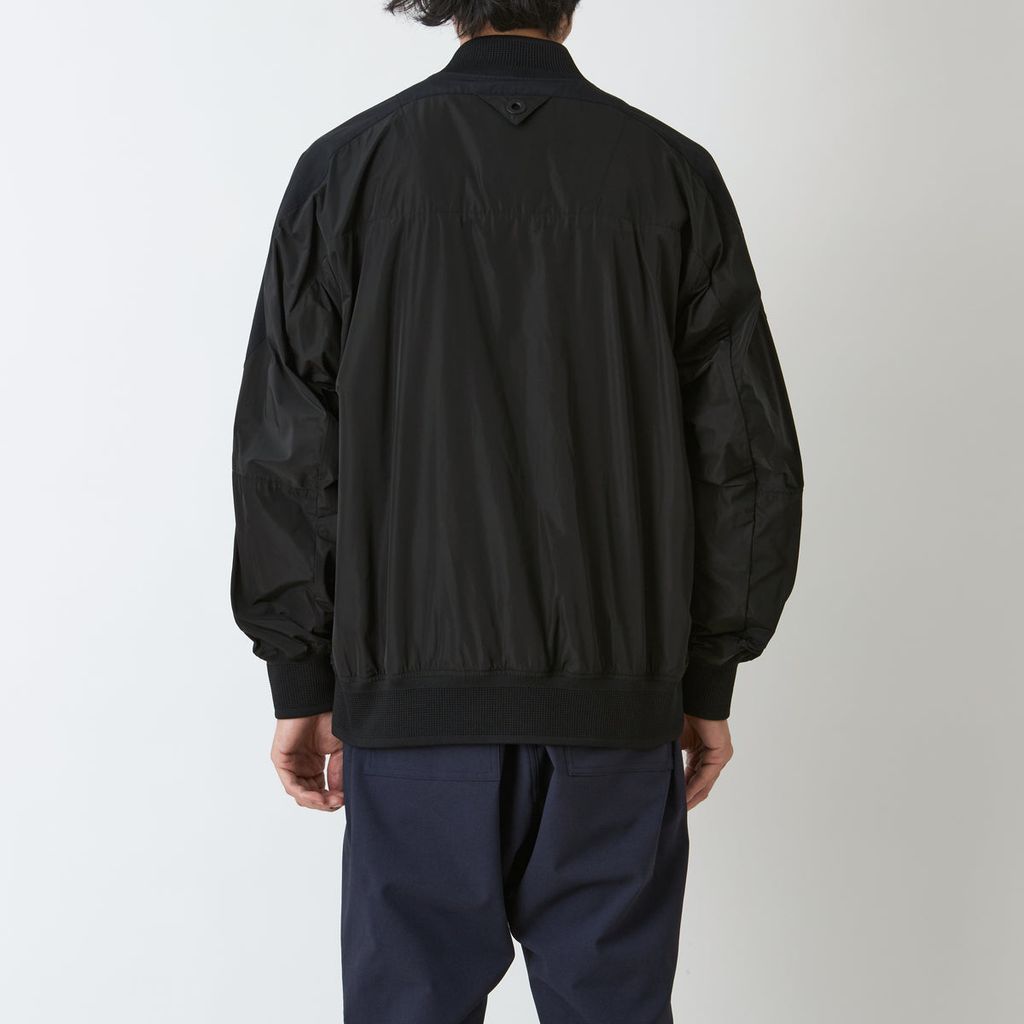 WHITE MOUNTAINEERING ASYMMETRY FLIGHT JACKET